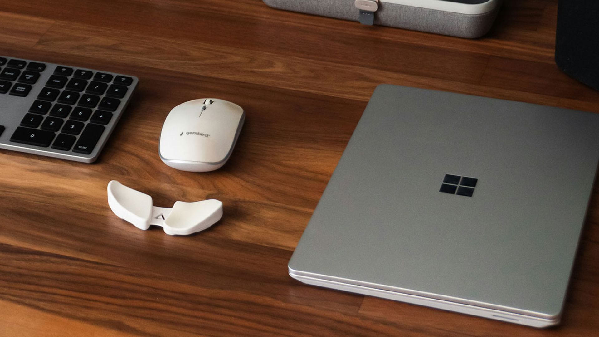 keyboard, mouse, and laptop sitting on desk